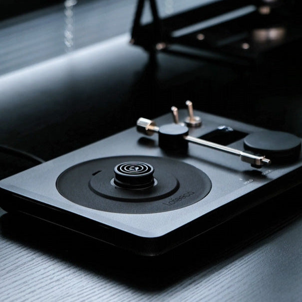 Lafeeca black electric kettle with a gooseneck spout and a DJ turntable base, designed for pour-over coffee brewing. #copper