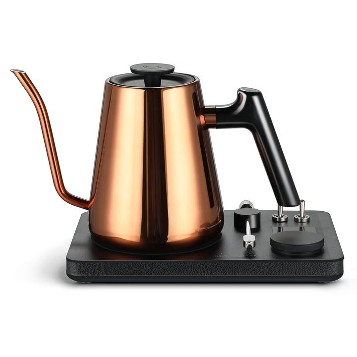 Lafeeca copper electric kettle with a gooseneck spout and a DJ turntable base, designed for pour-over coffee brewing. #color_copper